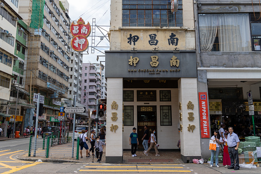 Hong Kong - August 15, 2023 : General view of the Nam Cheong Pawn Shop in Sham Shui Po, Kowloon, Hong Kong. It is a Grade III historic building.