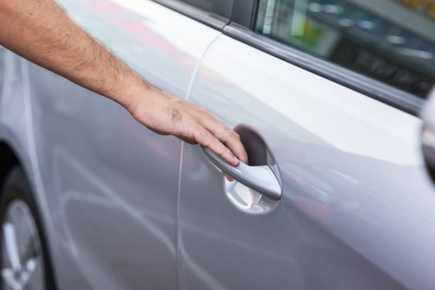 istock The driver opens the car door 1616530492