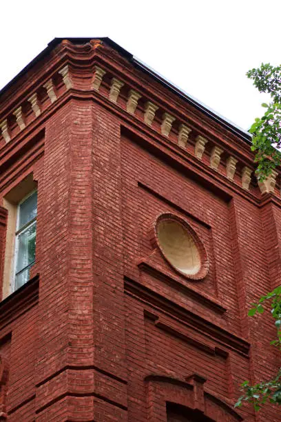Photo of Building of Kharkiv Polytechnic University made of dark red brick
