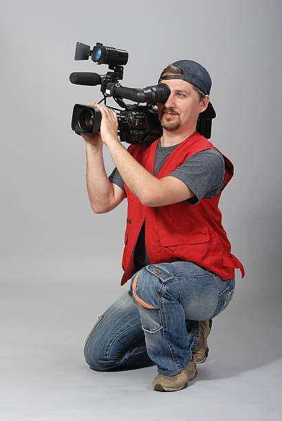 istock Cameraman in red vest 161657511