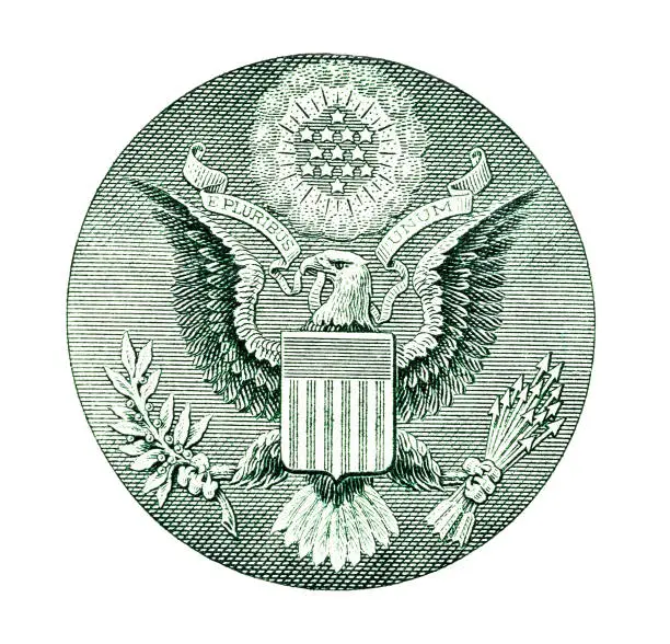 The Great Seal of the United States, featuromg an eagle grasping an olive branch in one talon, representing peace, and arrows in the other, symbolizing strength. The eagle's beak holds a banner with the motto "E Pluribus Unum" (Out of Many, One), signifying unity. A shield with 13 stripes on it represents the original states, and a constellation of 13 stars above symbolizes a new nation's birth.