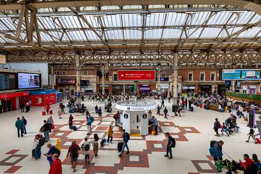 Jakarta, Indonesia - September 29, 2016: Inside of Main railway station, Jakarta Kota Station located in the Old Town area. It is a main railway station in Jakarta. People are around the area.