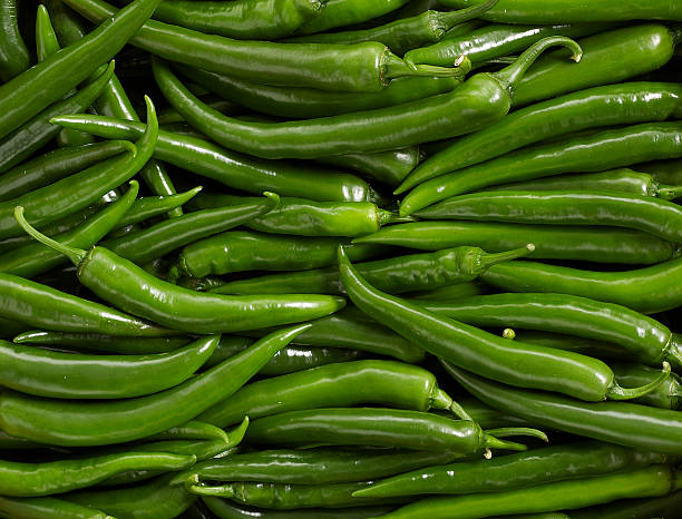 Green chili peppers stock photo