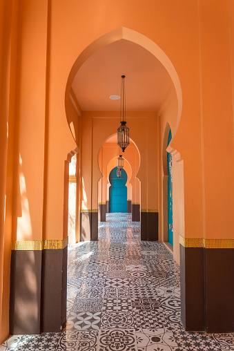 Beautiful hallway corridor Morocco architecture style. Lamp, tile and painting are unique Morocco style.