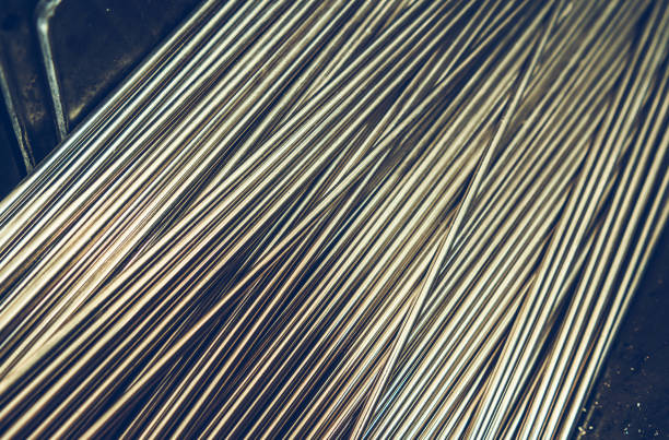 Metalworking Industry Theme. Pieces of Metal Wires Ready For Processing