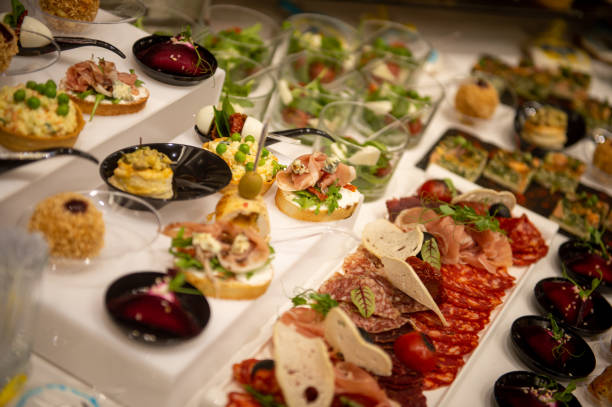 istock Buffet. Food. A catering system in which food is placed in a public area where diners serve themselves. Food serving. 1616661996
