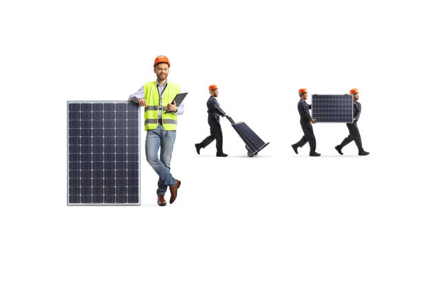 Engineer and factory workers carrying photovoltaic panels Engineer and factory workers carrying photovoltaic panels isolated on white background manufacturing sourcing stock pictures, royalty-free photos & images