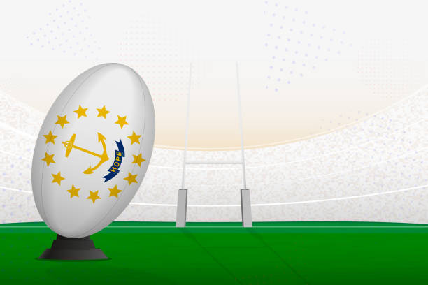 istock Rhode Island national team rugby ball on rugby stadium and goal posts, preparing for a penalty or free kick. 1616714425