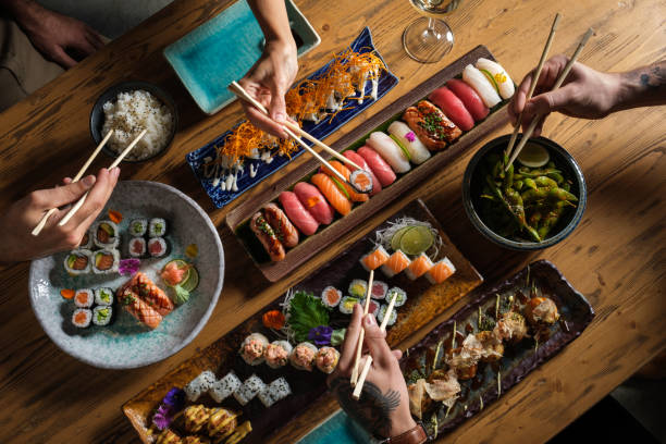 istock Unrecognizable people eating traditional Asian food 1616720893