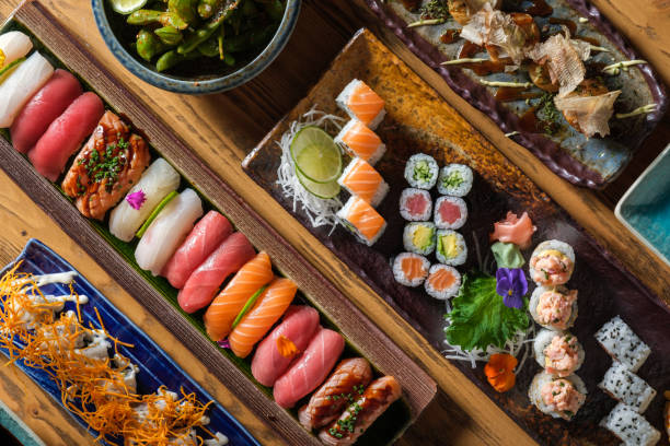 istock Food trays with various sushi 1616721464