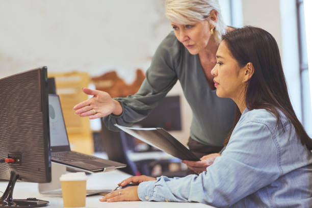 istock Female executive and manager planning work on computer in office 1616722177