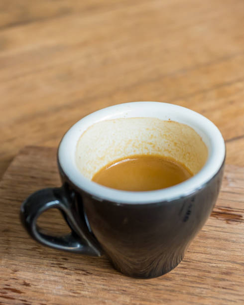 istock coffee espresso shot in a cup on a wooden table 1616722340