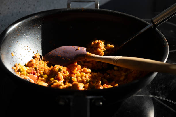 istock Homemade paella in a non-stick pan 1616722679