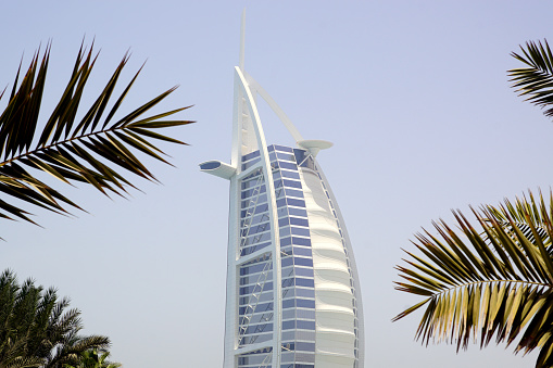 06/13/2021 - Dubai, United Arab Emirates\nBurj Al Arab is an iconic 5-star hotel in Dubai and one of the most luxurious in the world.\nIt was designed by the multidisciplinary consultancy Atkins, led by architect Tom Wright of WKK Architects.\nThe hotel is managed by the Jumeirah Group.\nIt was opened on 1st December 1999.