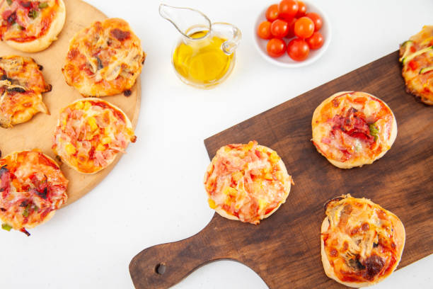 istock Delicious just baked homemade mini pizzas. 1616814357