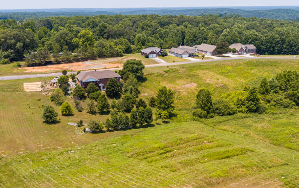 agricultural fields in a mall rural town of addison, alabama, on a sunny summer day. aerial drone-made view. - town rural scene road new england imagens e fotografias de stock