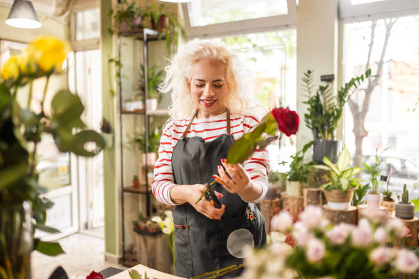istock Woman with Curly Hair at Work 1616940115