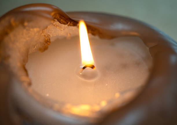 istock Close-up of a burning candle 1616947287