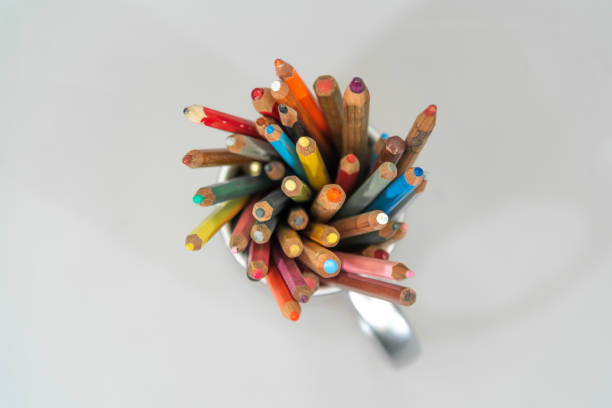 istock Close up of colored pencils in a container 1616950599