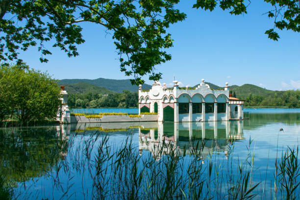 Typical Catalan house that used to be used by fishermen on the lake of Banyoles on a spring day