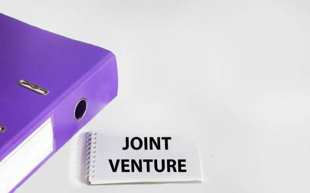 istock Handwriting text writing Joint Venture. Concept meaning Cooperation Arrangement, Partnership Group, White Background 1616975851