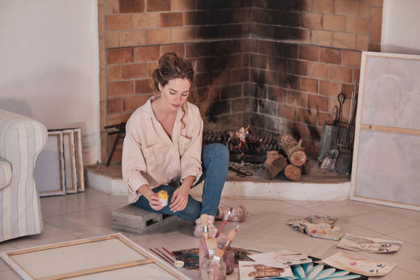 istock Young woman painting in studio 1616978473