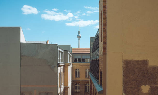 istock elevated View through a backyard with old buildings to the television tower in Berlin 1616990879