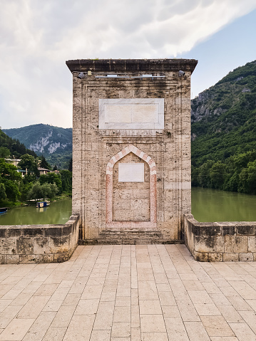 Monument Kapı (Door) on Mehmed Pasa Sokolovic bridge (Na Drini cuprija) over river Drina in Visegrad, Bosnia and Herzegovina.