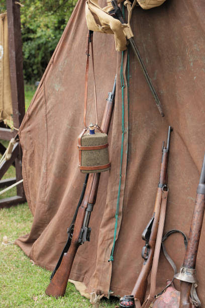 istock Second World War era water canteen and rifles 1617037335