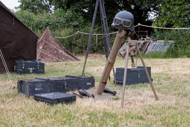 istock German ww2 era helmet, goggles and mortar 1617064994