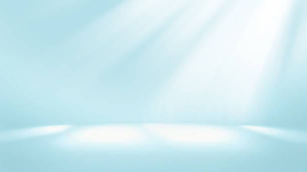 Original abstract background image in light turquoise colors for creative work. Minimal abstract light blue background for product presentation. Incident light from window on wall and floor. brightly lit stock pictures, royalty-free photos & images