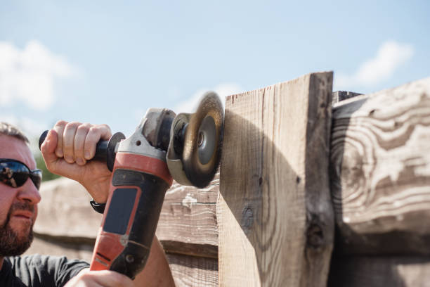 istock Dirty and dusty work with a sanding disc on wood 1617099282