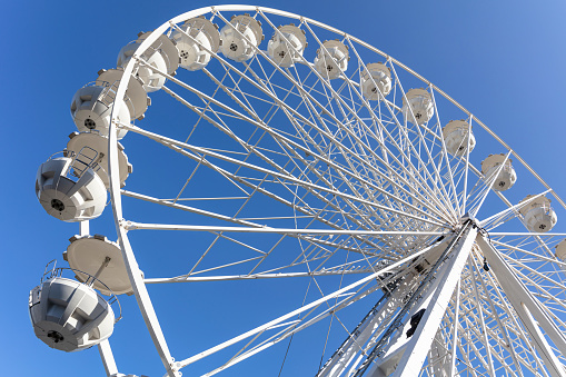 big wheel against blue sky