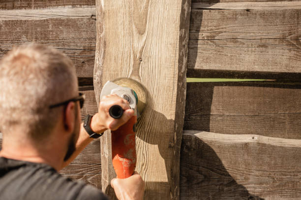 istock Dirty and dusty work with a sanding disc on wood 1617099824