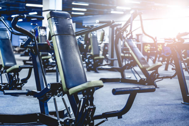 istock Fitness and bodybuilder machine for shoulders 1617100822