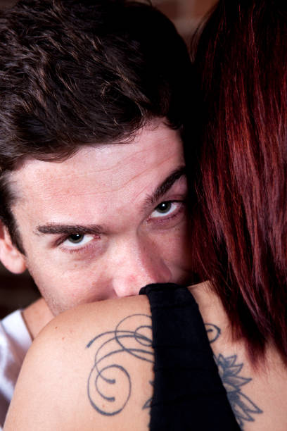 istock Man Looking over a Girls Shoulder 161710804