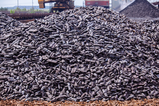 Large heap of briquetted iron