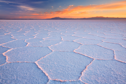 The world's largest salt flat, Salar de Uyuni in Bolivia, photographed at sunrise.