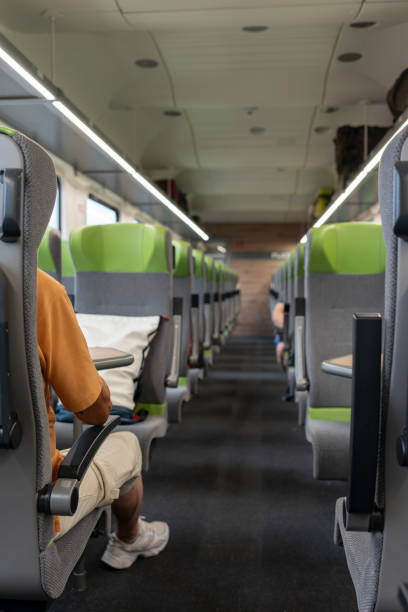 istock A half-empty passenger car of a high-speed train. 1617125165