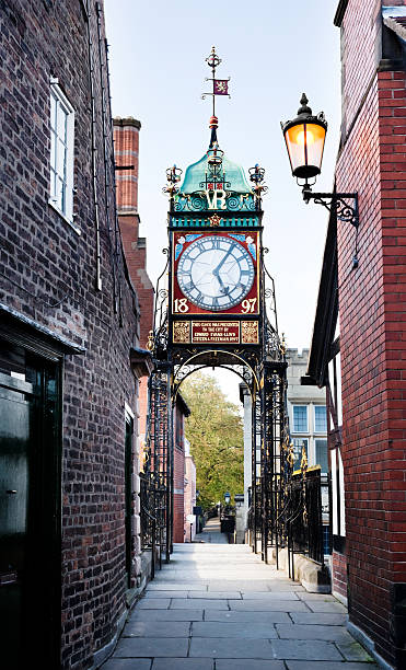 Chester Eastgate Clock from the rampart Chester's  Eastgate Clock as seen from the South, on the rampart. The clock was built at the very end of the 19th century to commemorate Queen Victoria's 60th year of reign. chester england stock pictures, royalty-free photos & images