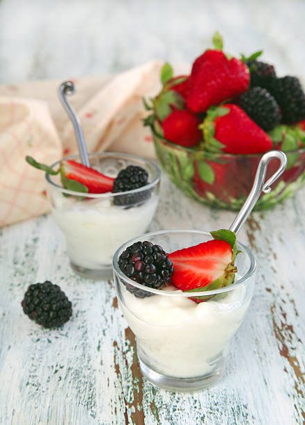 istock Yogurt with fresh berries in small glass cup 161714846