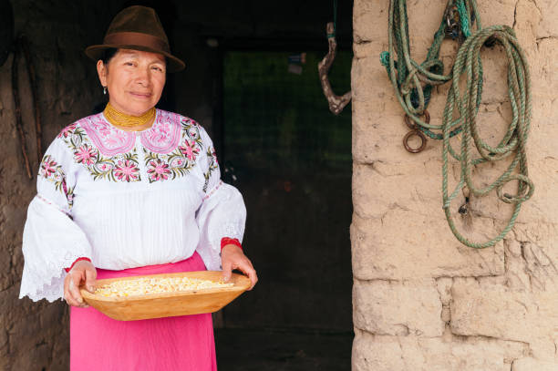 istock indigenous woman holding corn 1617151701