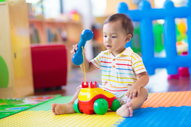 istock Cute baby boy in kindergarten or daycare. 1617153268