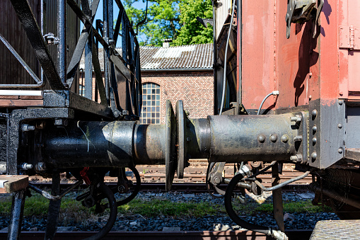 Steam locomotive coupler and shock absorber