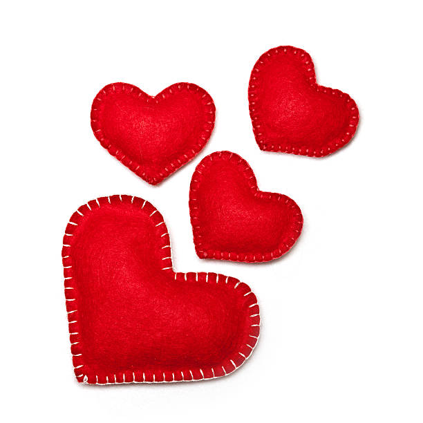 Hearts Felt red hearts isolated on a white background felt heart shape small red stock pictures, royalty-free photos & images