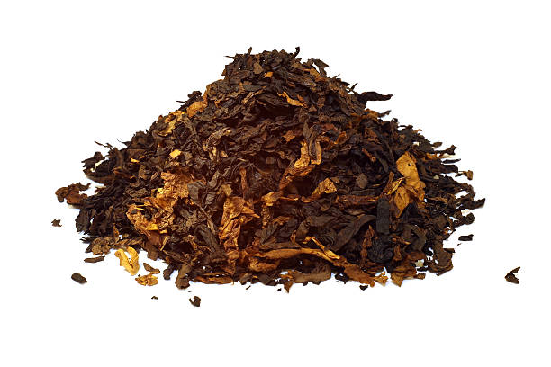 Pile of pipe tobacco isolated on white stock photo