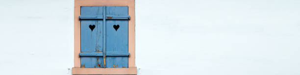 Banner 4x1 old blue window with shutters, hearts on shutters, blue background