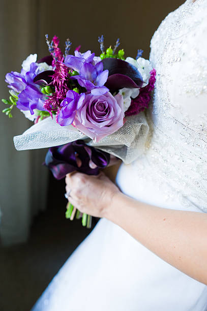 istock Bride Holding Flower Bouquet 161719768