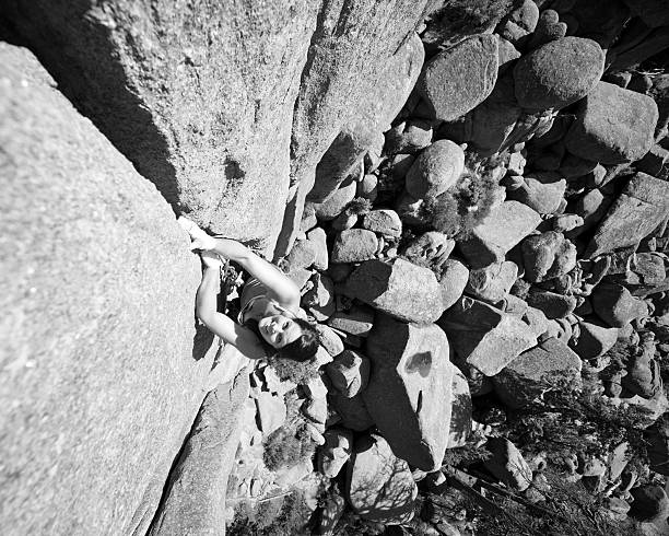 istock Athletic Attractive Woman Rock Climbing in Black and White 161720027