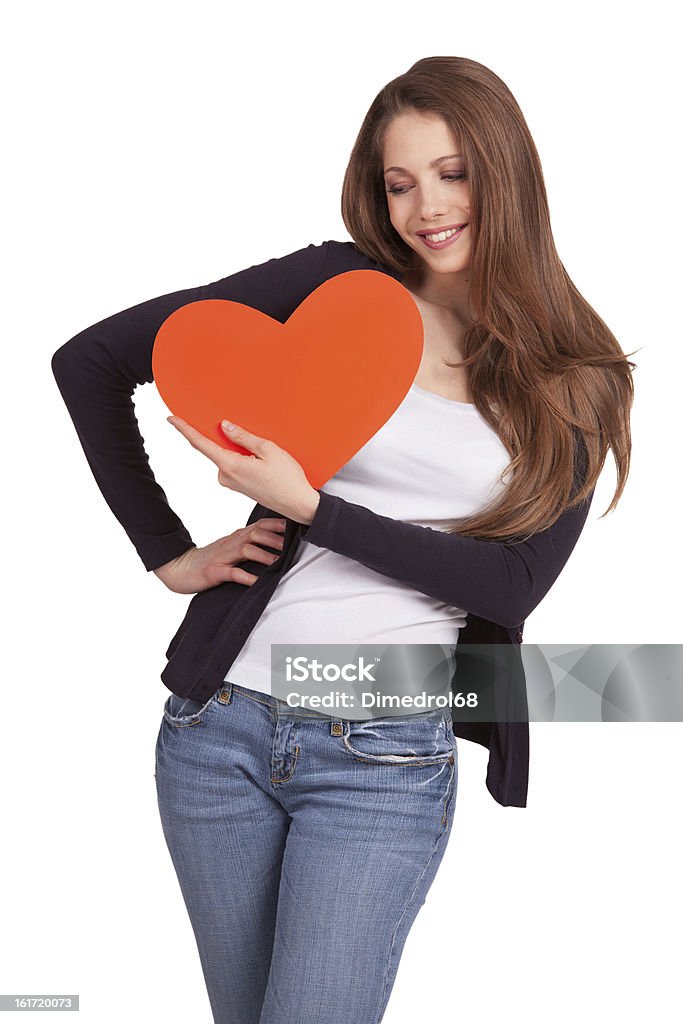 Schöne junge Frau, die hält ein Herz - Lizenzfrei Anmut Stock-Foto